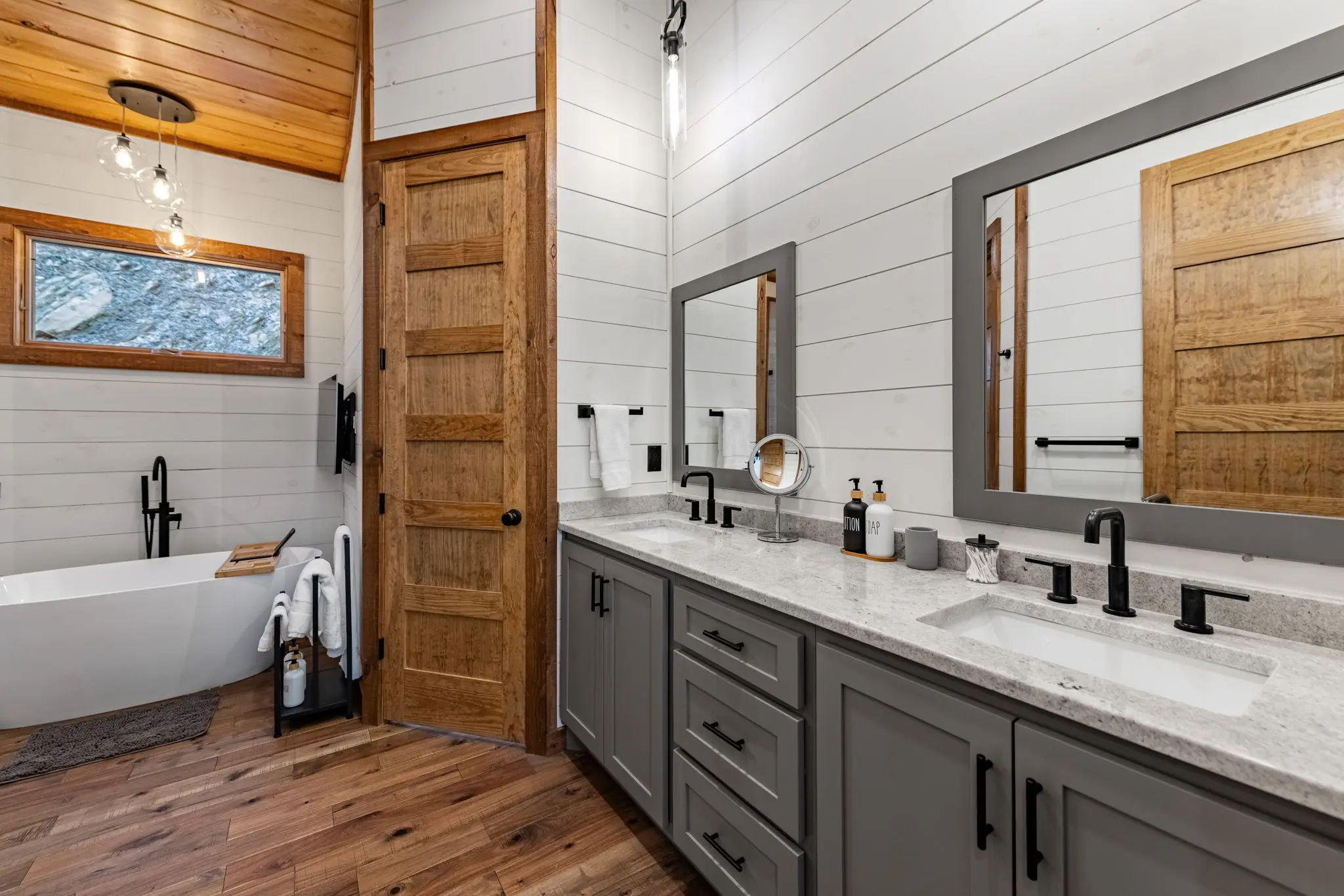 Ensuite mirrors and ambient lighting for morning routines.