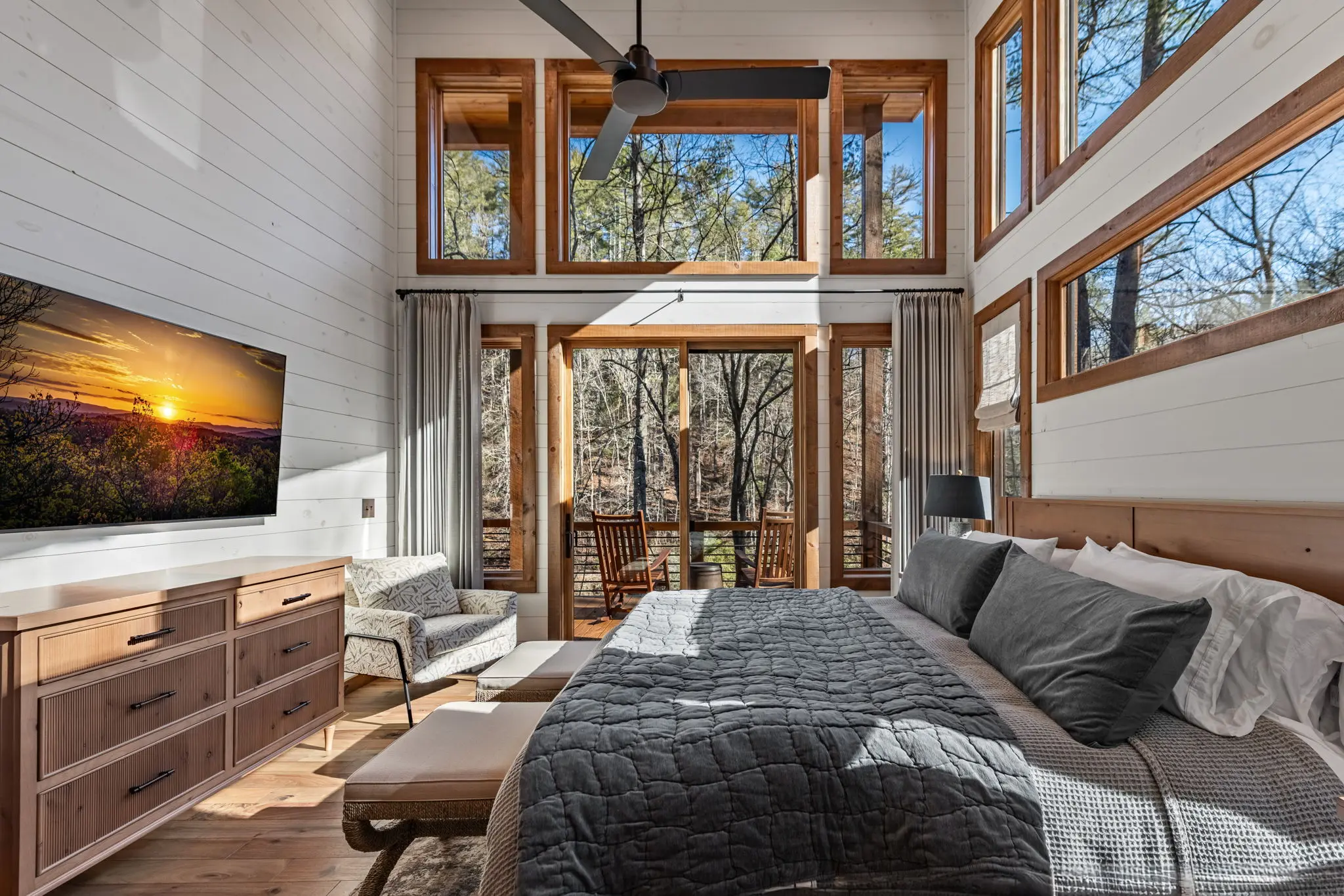 Secondary upper bedroom with soft textures and quiet retreat style.