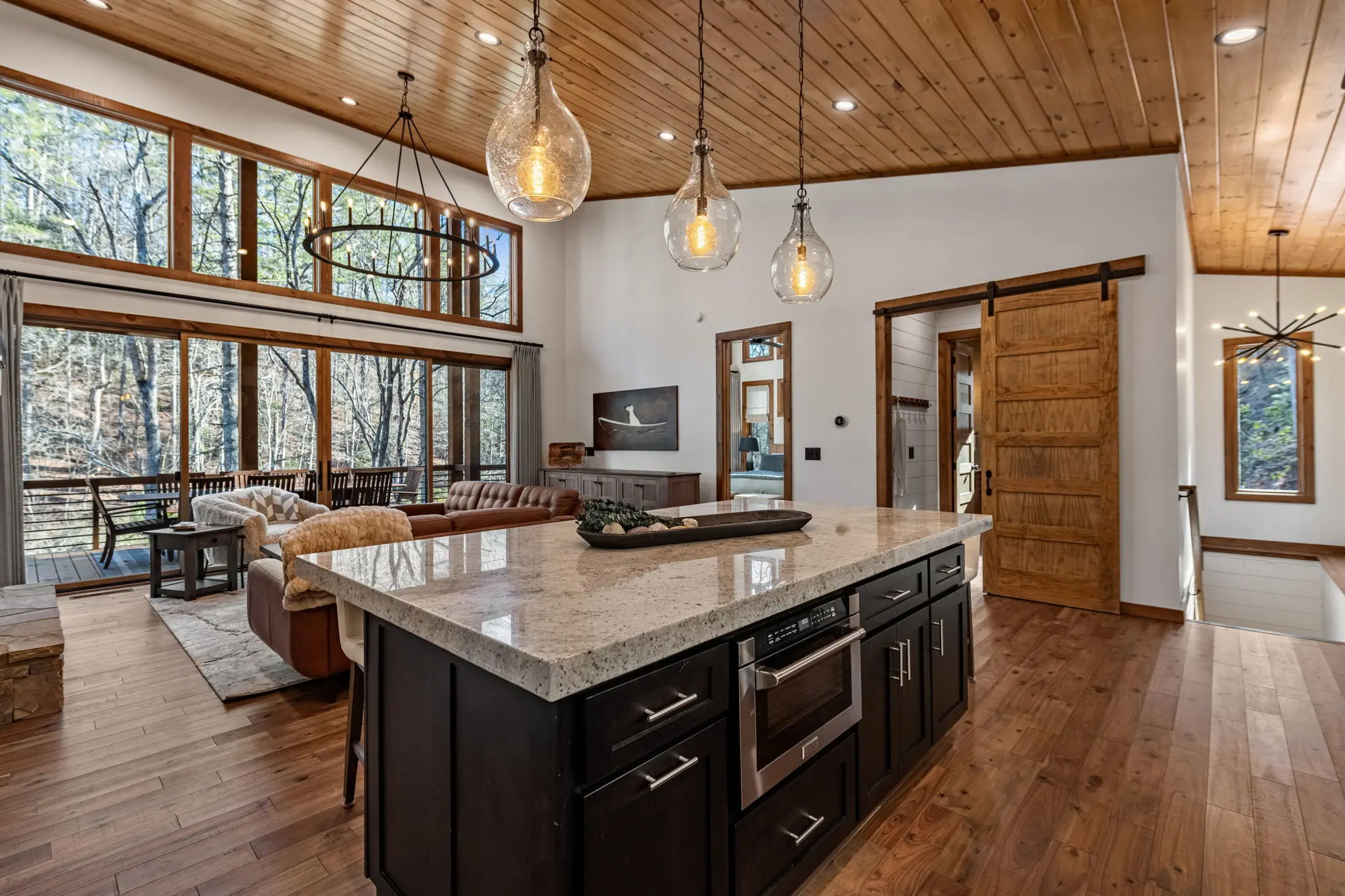 Chef's eye view of the upper kitchen island to allow conversations with the guests in the living area.