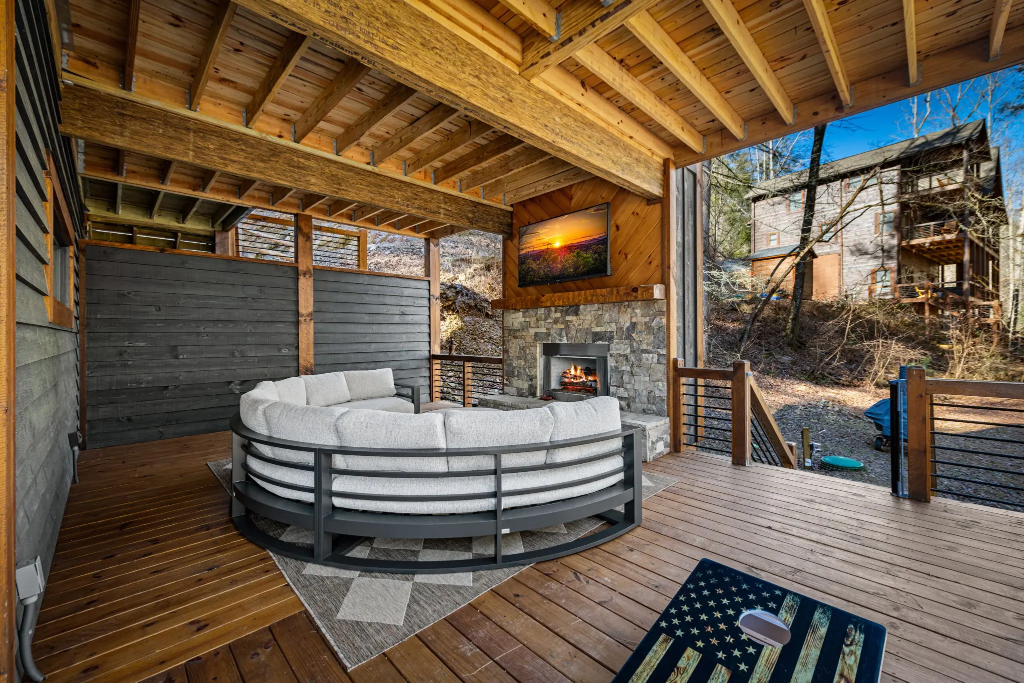 A lower balcony outlook showing the comfy fireplace circle couch.