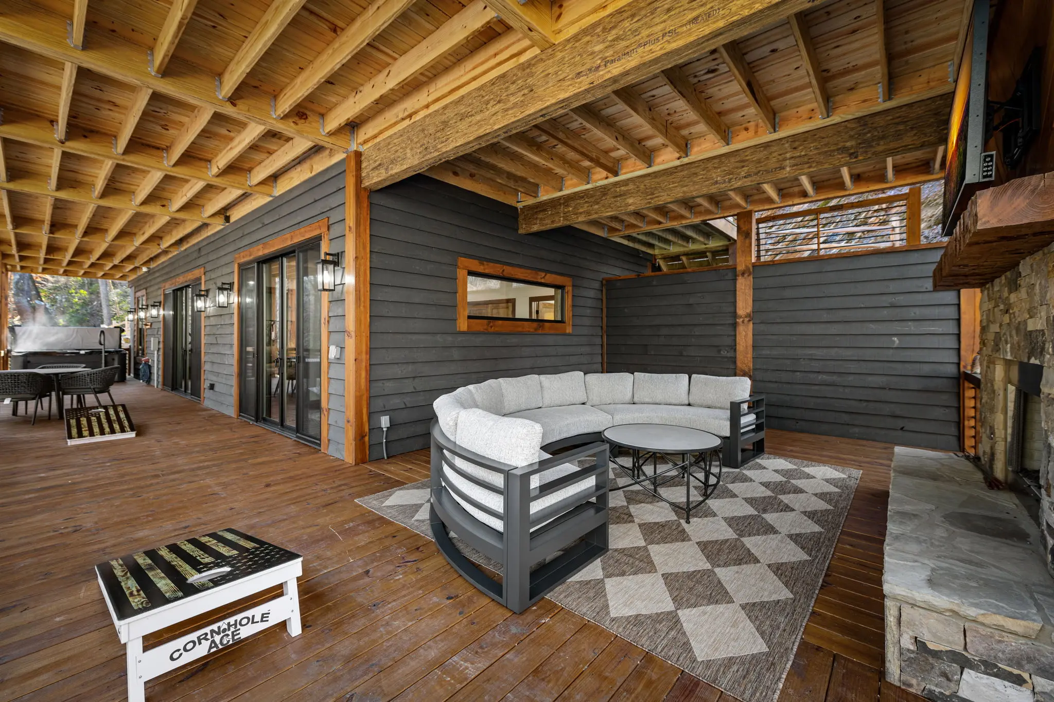A reverse lower balcony view showing the comfy fireplace circle couch.