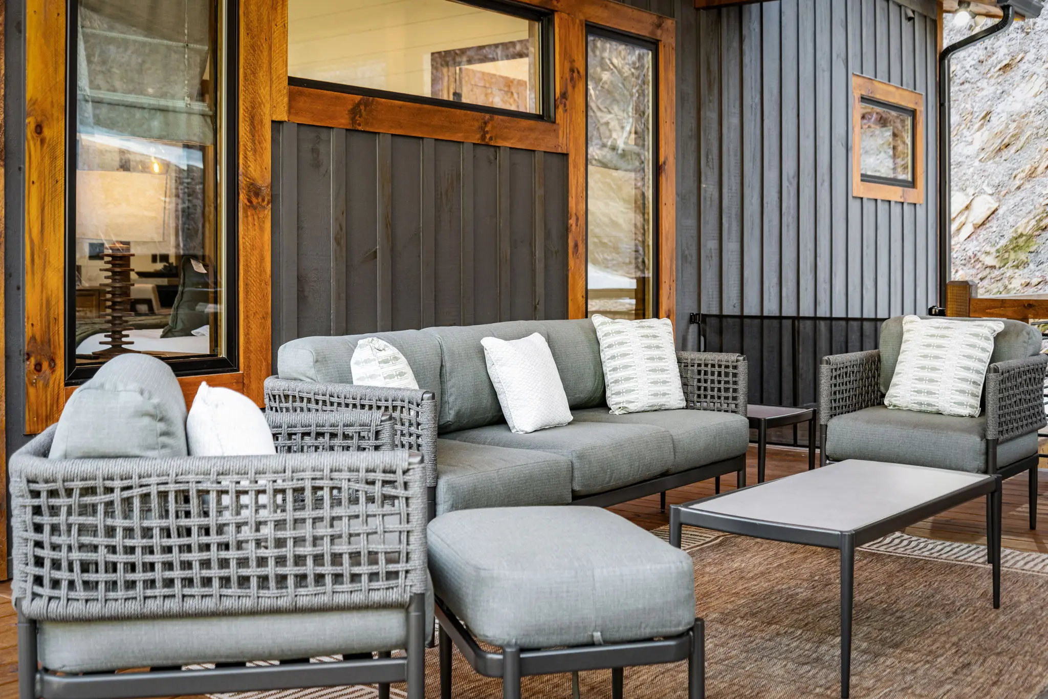 Upper balcony area with comfortable seating and scenic views.